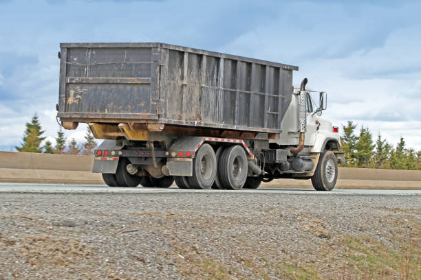 istock Truck On Highway Transporting Industrial Waste Container 886968888
