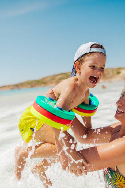 istock Sea bathing with my mom 886969006