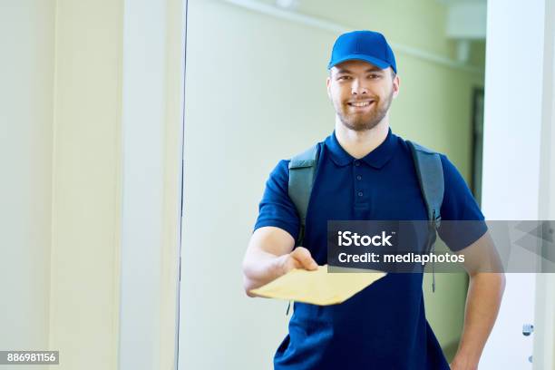 Home Mail Delivery Stock Photo - Download Image Now - Envelope, Delivery Person, Giving