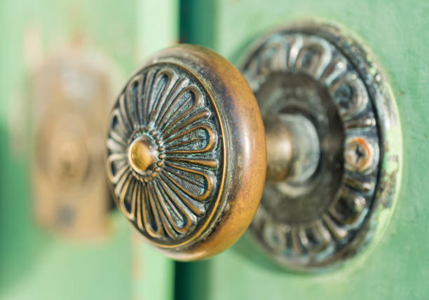 Antique hand shaped door knocker closeup