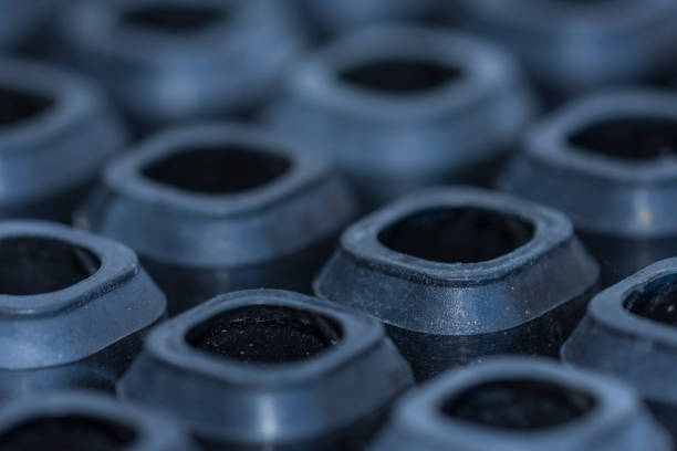 Smiley face made from coffee capsules on the white background