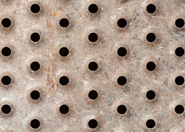 istock old metal plate with holes 886986940