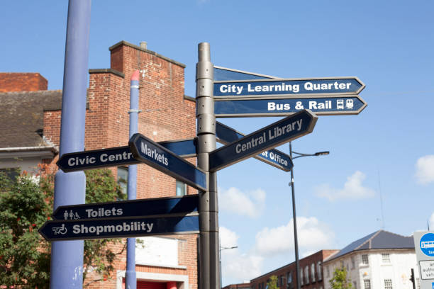 istock Road sign with many directions 886992488