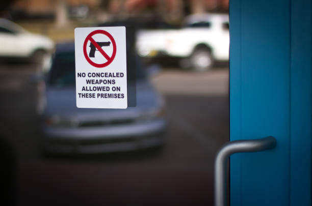 Notice for Gun-Free Zone/No Concealed Weapons Sign Notice for Gun-Free Zone/No Concealed Weapons Sign gun control photos stock pictures, royalty-free photos & images