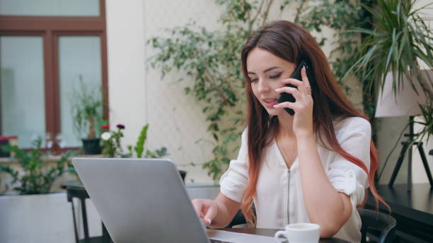 istock A Lady Talking on the Phone in the Room 887013666