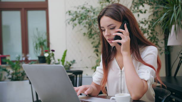 istock A Lady Talking on the Phone in the Room 887013686