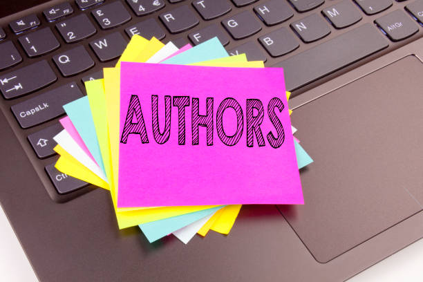 istock Writing Authors text made in the office close-up on laptop computer keyboard. Business concept for Word Message Text Typography Workshop on the black background with copy space 887031088