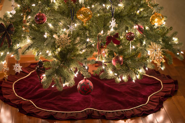 christmas decorations hanging on tree - skirt imagens e fotografias de stock