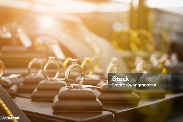 Jewelry Diamond Rings And Necklaces Show In Luxury Retail Store Window Display Stock Photo - Download Image Now
