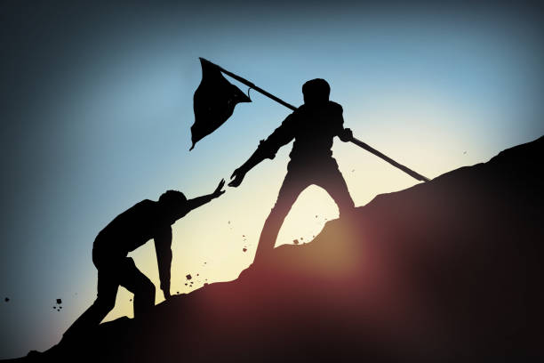 istock a man help his friend to target,Success concept 887059368
