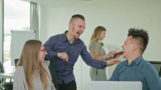 istock Two People are Working on a Laptop 887067298