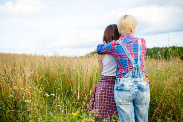 istock two girlfriends in the open air 887070046