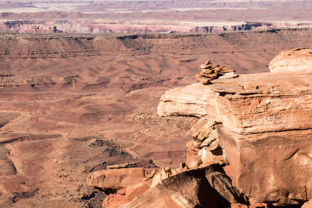 istock Rock cairn on a cliff in Canyonlands National Park 887072438