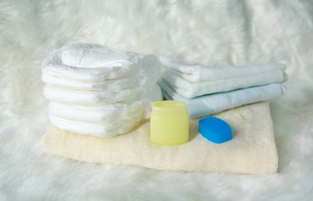 istock Collection of items for newborn babies on the bed. 887080868