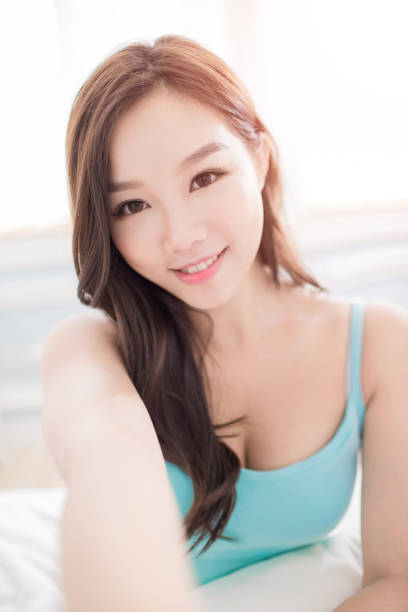 istock woman selfie in home 887091146