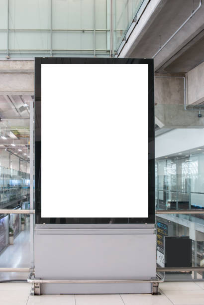 istock Blank billboard advertising panel in terminal airport, Mock up white, insert for text of customer. Space for texting in products or promotional at airport,train station,advertising public commercial. 887093538