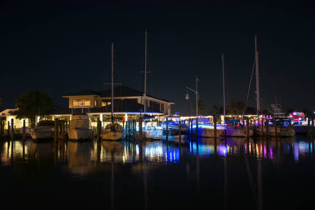 istock Boats with Christmas lights 887098116