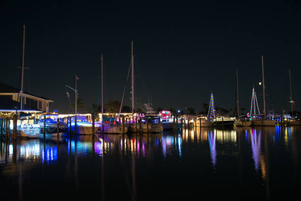 istock Boats with Christmas lights 887100504