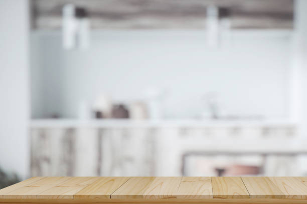 istock Empty wood table counter in modern kitchen room. for product montage display. 887103790