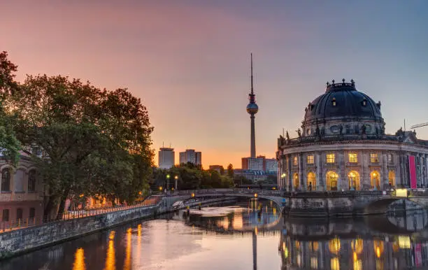 Beautiful sunrise at the Museum Island in Berlin with the Television Tower in the back