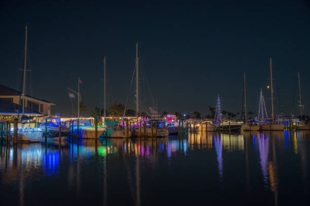 istock Boats with Christmas lights 887116456