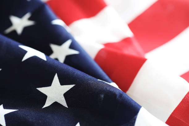istock American flag on a wooden texture table 887127404
