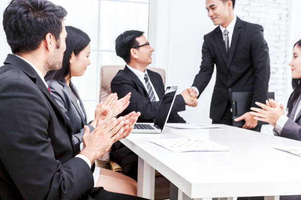 istock Business people clapping hands in the meeting 887138552