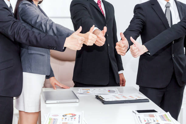 istock Business teamwork show thumb up 887138592