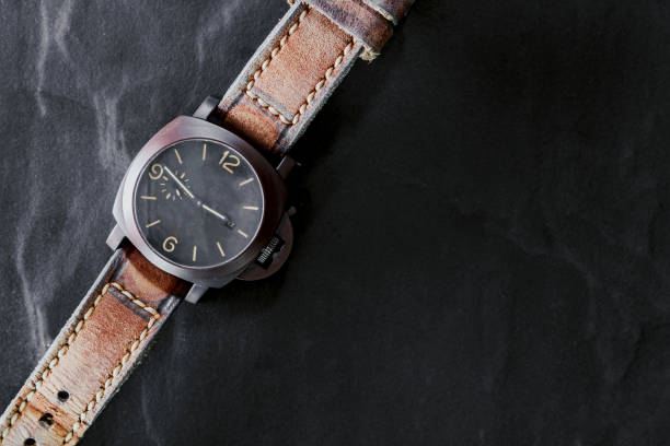 istock luxury fashion watch on black background 887144036