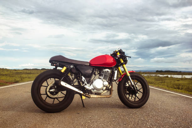 Vintage cafe racer motorcycle on the road. motorbike. Outdoors. Vintage cafe racer motorcycle on the road. motorbike. Outdoors. cafe racer stock pictures, royalty-free photos & images
