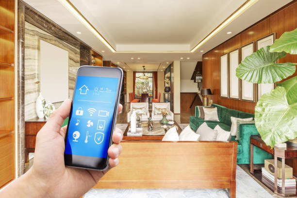 istock smart phone with smart home with modern living room 887147272