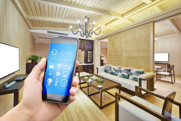istock smart phone with smart home with modern living room 887147422