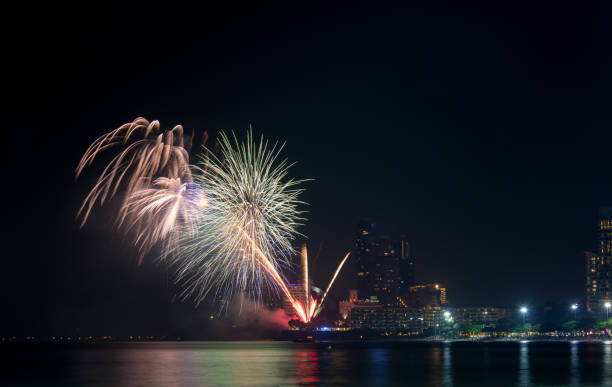 istock New Year celebration fireworks. Brightly Colorful Fireworks isolated black background. 887163678