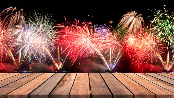 istock Brightly Colorful Fireworks isolated black background. New Year celebration fireworks. 887164444