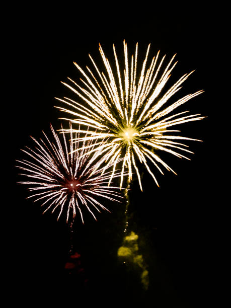 istock New Year celebration fireworks. Brightly Colorful Fireworks isolated black background. 887166886