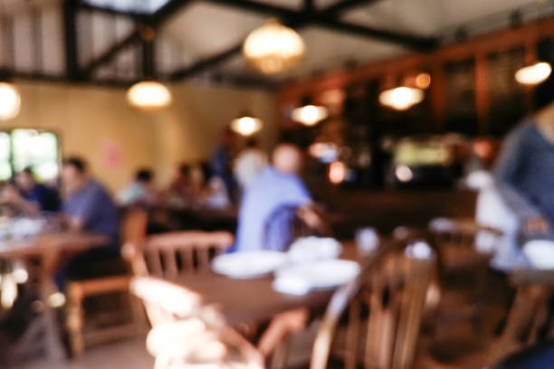 istock Defocused Blur coffee shop or cafe restaurant with customer abstract bokeh light image background 887167378