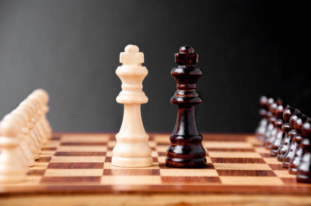 istock Chess pieces on chessboard: the concept of negotiations 887167664