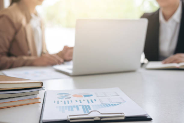 istock Business team meeting working with new startup project, discussion and analysis data the charts and graphs, calculator, laptop computer using, Business finances and accounting concept 887209588