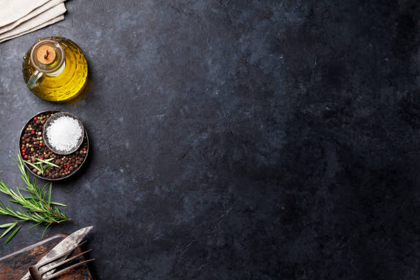 istock Cooking ingredients and utensils on stone table 887217160