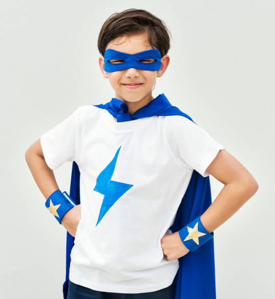 A boy playing superhero