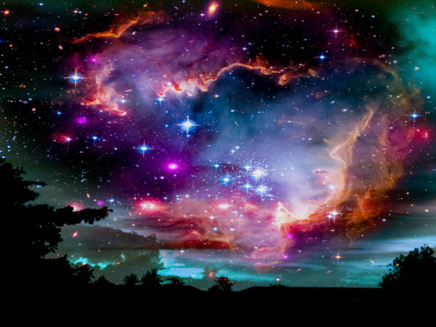 istock galaxy smoke in night dark blue sky and silhouette tree 887227408