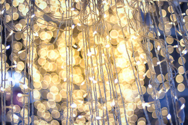 istock LED light on Christmas tree with bokeh blur for Christmas and new year day 887232926