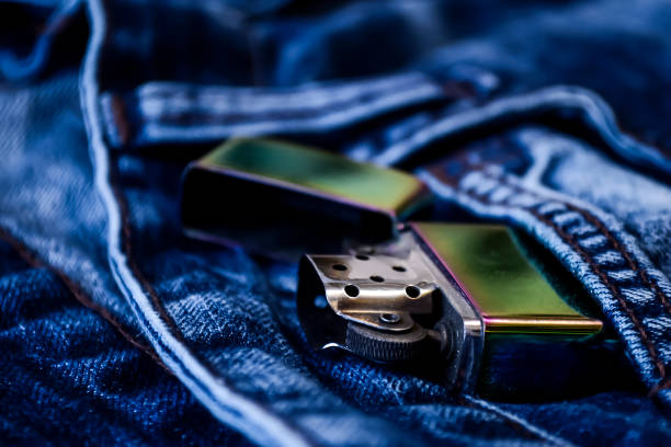 istock Denim clothes lying on the table with the glasses. Blue jeans wi 887233548
