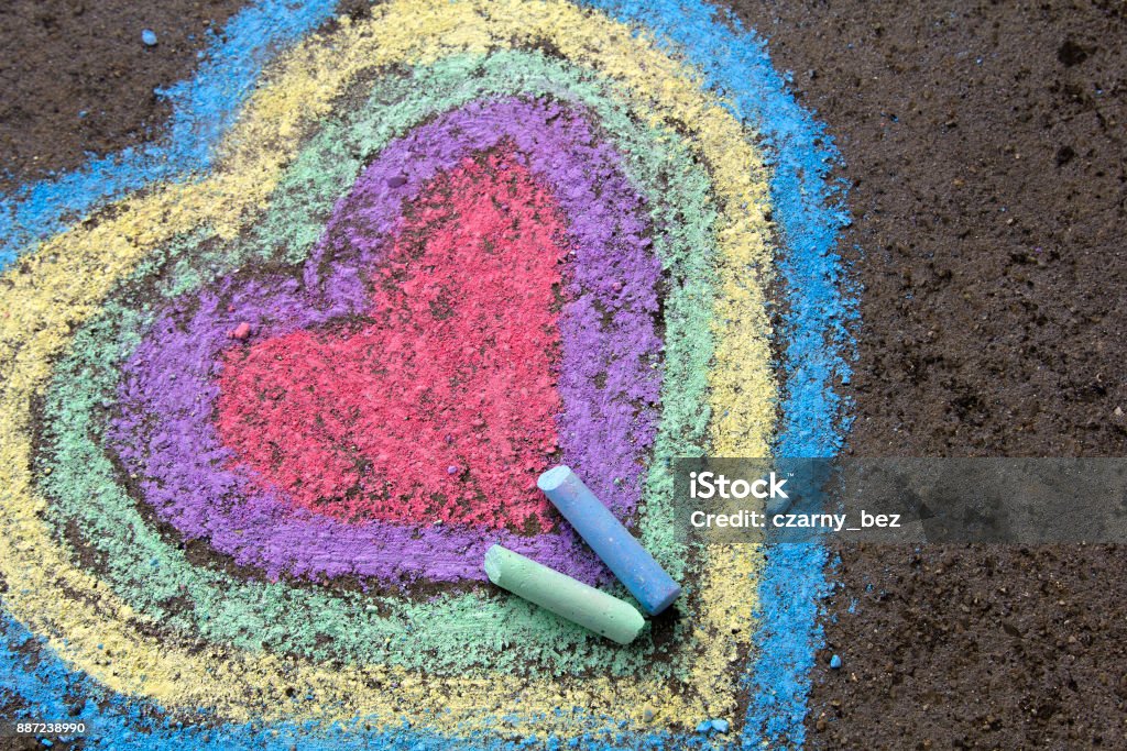 chalk drawing: colorful hearts on asphalt Chalk Drawing Stock Photo