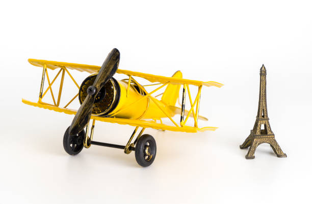 istock Vintage plane with Paris Eiffel tower for Vintage Travel concept 887239294