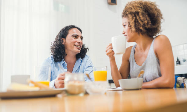 istock Mixed race couple having breakfast. 887240442