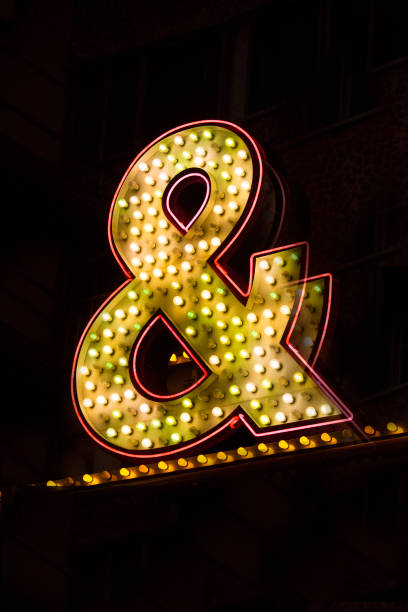 istock Neon ampersand sign - Stock image 887242678