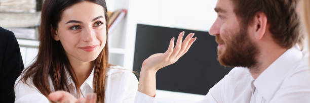istock Group of people deliberate on white board 887246012
