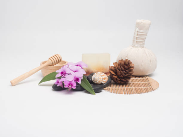 istock Spa set ,candle,coconut,flower,soap ,massage, with wood white background (top view) 887246314