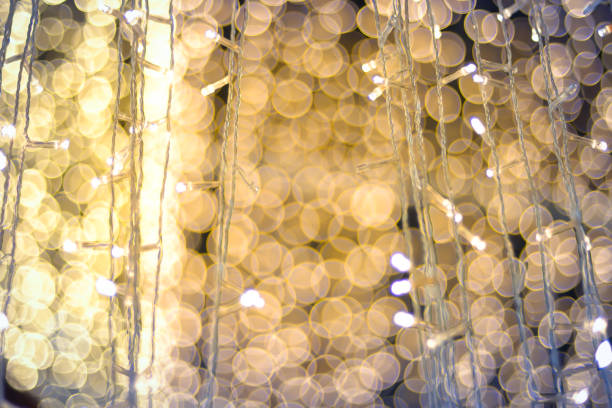 istock LED light on Christmas tree with bokeh blur for Christmas and new year day 887247224